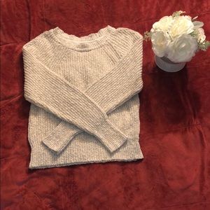 Free People crew neck tan cable knit sweater.